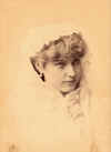 Annie_Russel_studio_shot_with_white_veil-postcard-tinted-Resized.jpg (47736 bytes)